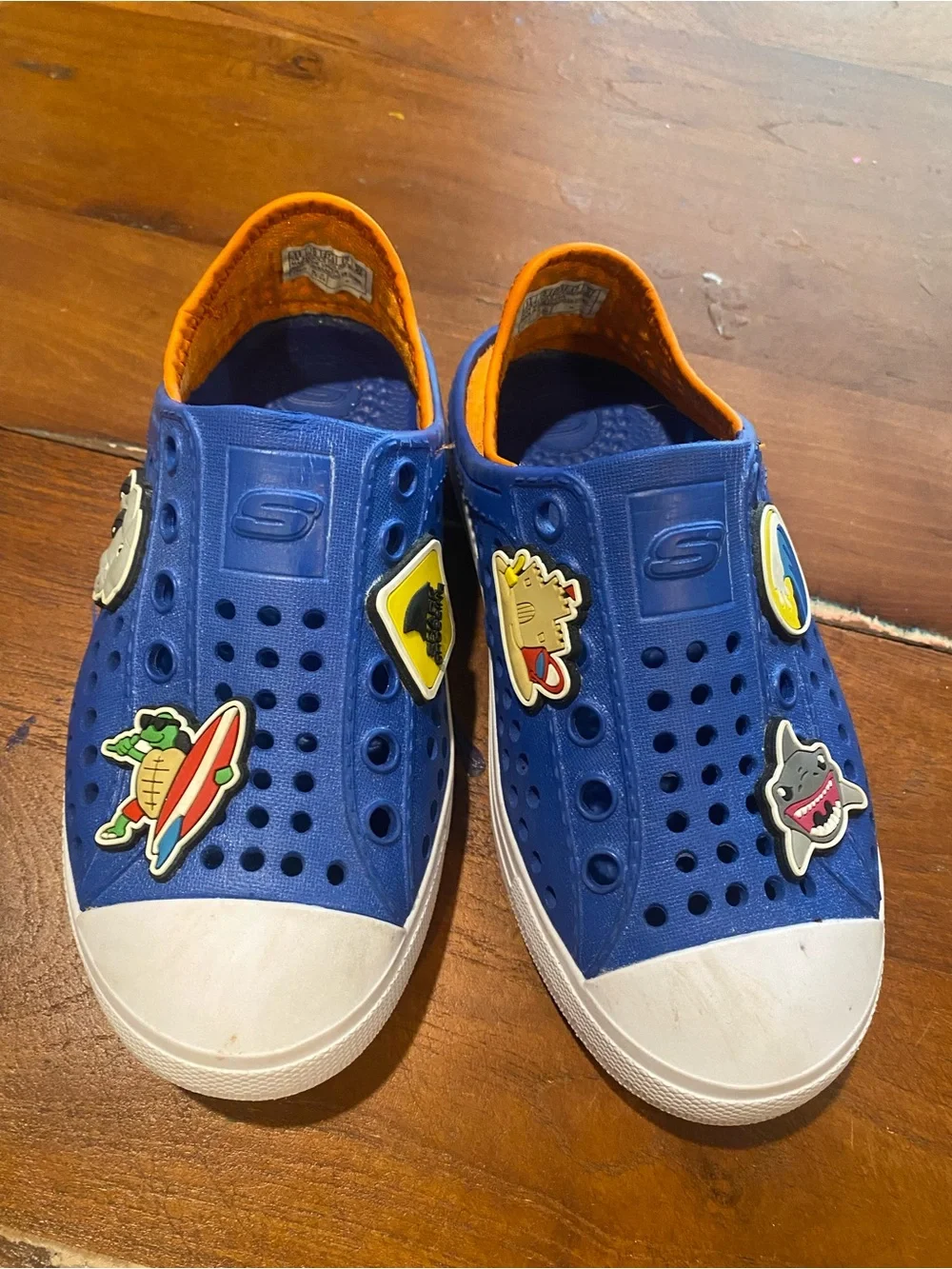 Skechers Kids Blue Slip-On Water Shoes with Orange Trim and Fun Charms